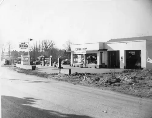 Photo: Kennedy's Garage in 1955, with some of the hire fleet parked in the forecourt.