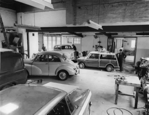 Photo: Vehicle repairs being carried out in Kennedy's bodyshop in 1968.