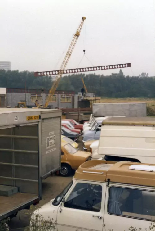Photo: Construction of Kenhire's workshop extension in 1979 with hire vehicles in the foreground.