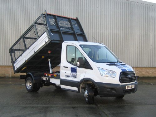 Photo: A Transit Tipper with caged body.